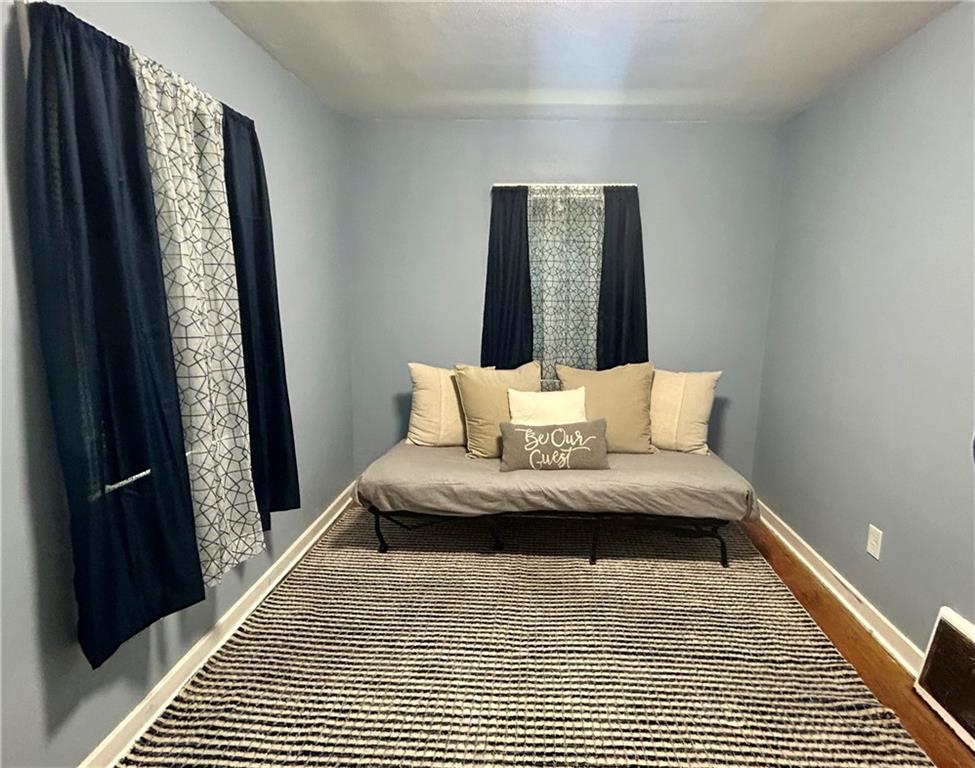 1133 Venetia Road Eighty Four, PA 15330 - Photo 14 of 26 a bedroom with a bed and a rug