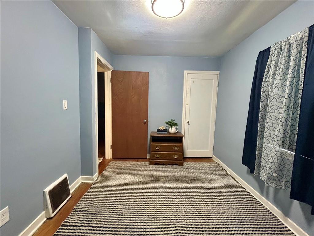 1133 Venetia Road Eighty Four, PA 15330 - Photo 15 of 26 a view of room with furniture and wooden floor
