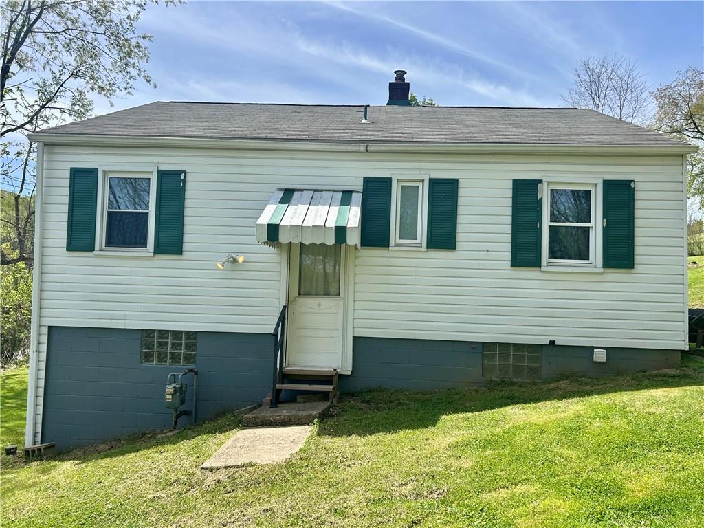 1133 Venetia Road Eighty Four, PA 15330 - Photo 25 of 26 a front view of a house with garden