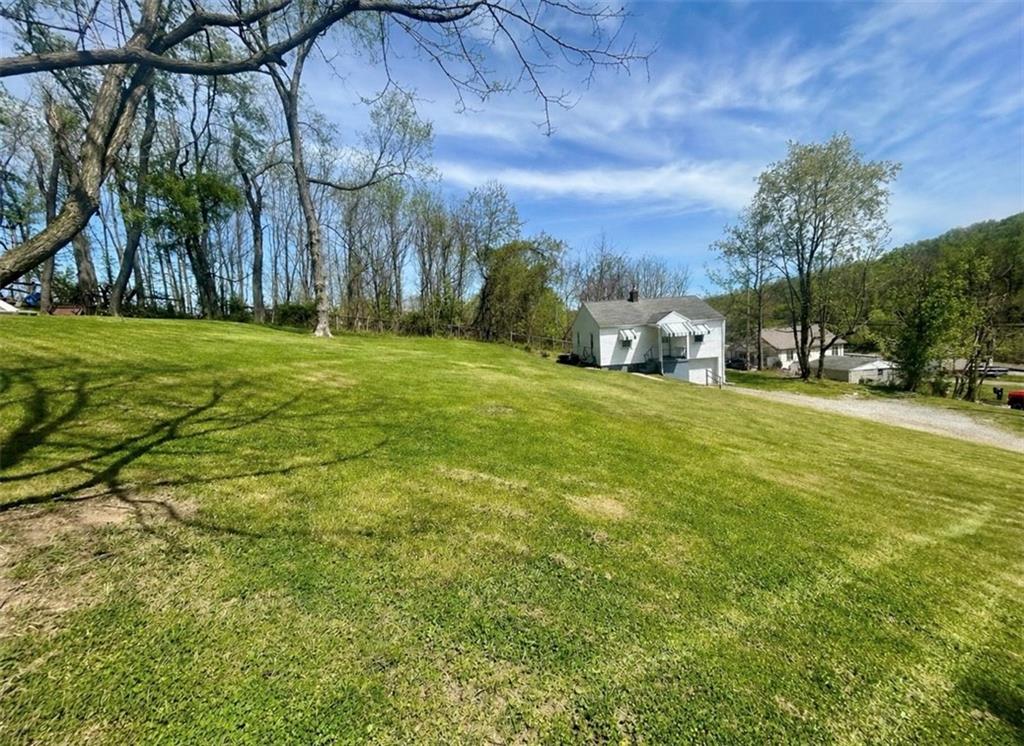 1133 Venetia Road Eighty Four, PA 15330 - Photo 3 of 26 a view of a park with large trees