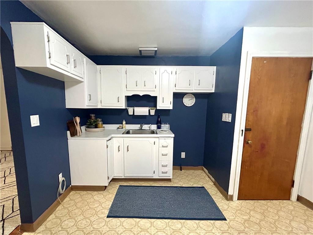 1133 Venetia Road Eighty Four, PA 15330 - Photo 8 of 26 a kitchen with a refrigerator and a stove