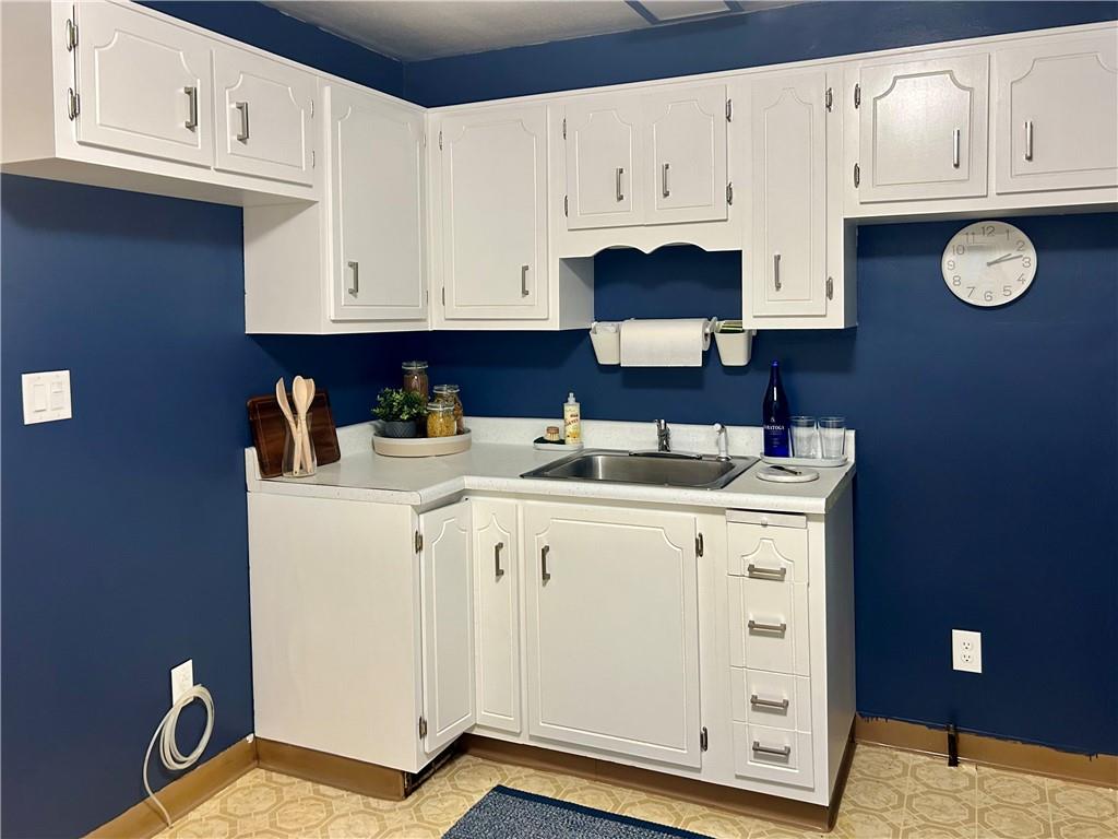 1133 Venetia Road Eighty Four, PA 15330 - Photo 9 of 26 a kitchen with cabinets appliances