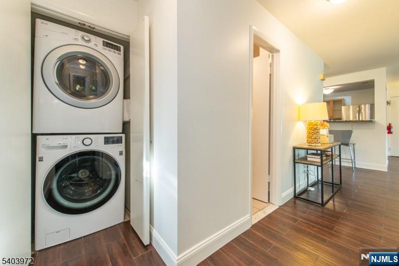 105 River Road, Unit C1 Nutley, NJ 07110 - Photo 18 of 22 a view of a hallway with washer and dryer