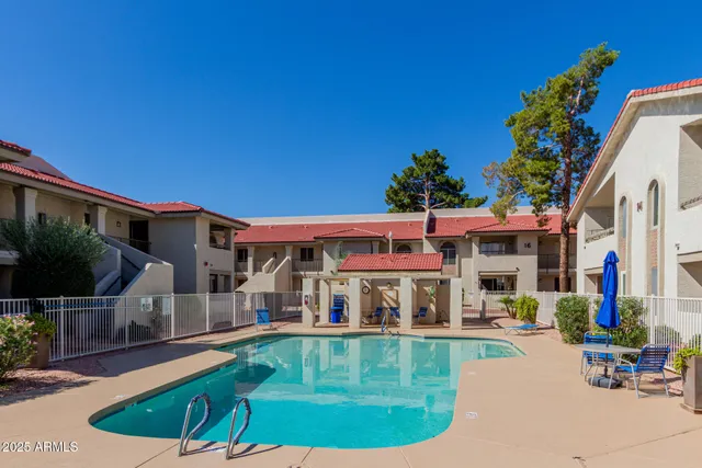 a view of a house with swimming pool