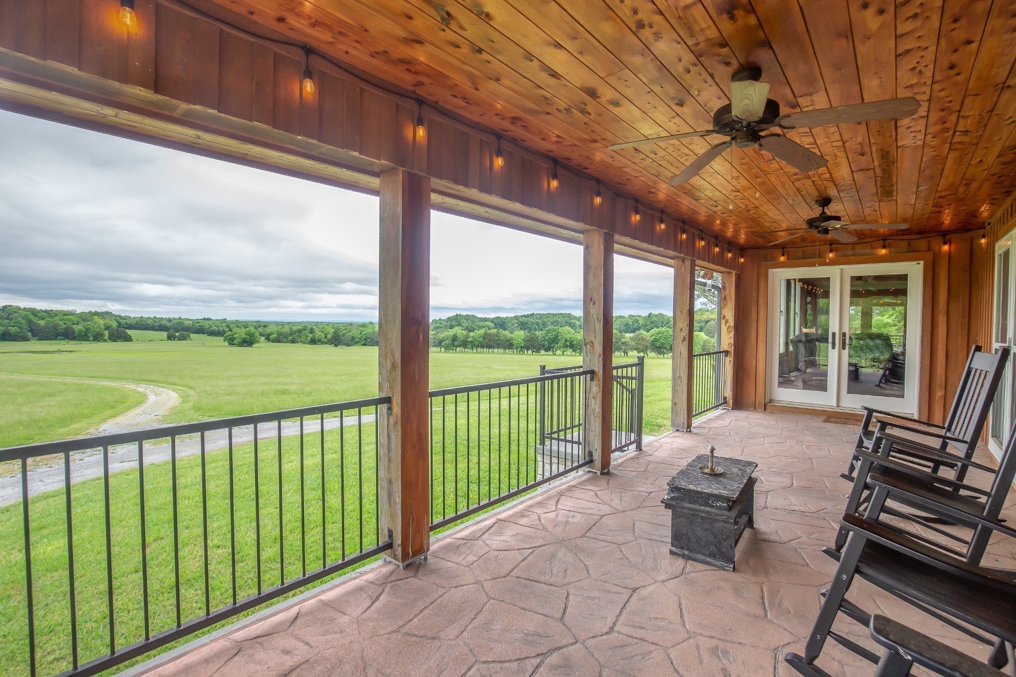 521 Coop Road Bell Buckle, TN 37020 - Photo 15 of 63 a balcony with furniture and a view of city