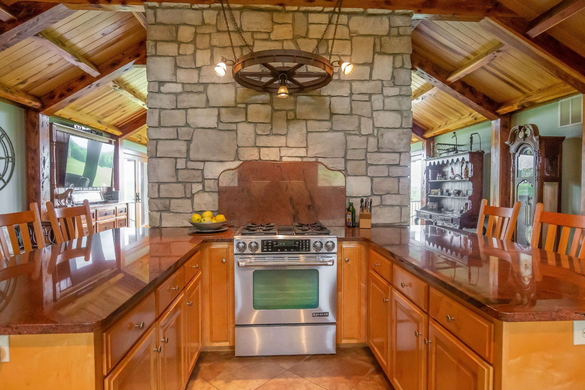 521 Coop Road Bell Buckle, TN 37020 - Photo 30 of 63 a kitchen with stainless steel appliances granite countertop a stove a sink and dishwasher