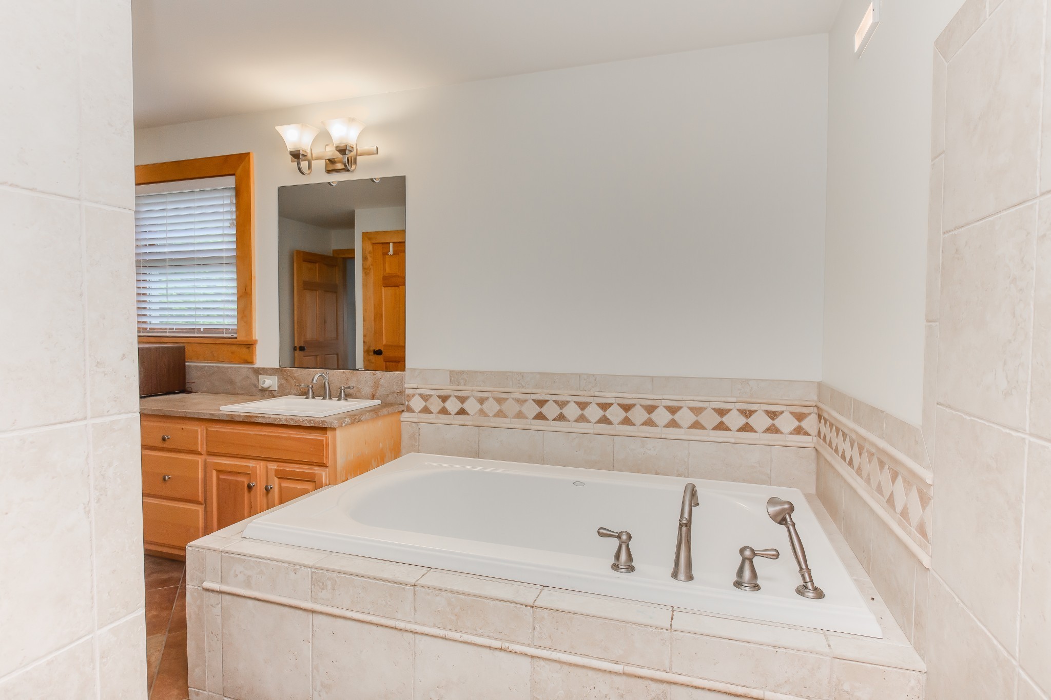 521 Coop Road Bell Buckle, TN 37020 - Photo 53 of 63 a bathroom with a bathtub and sink