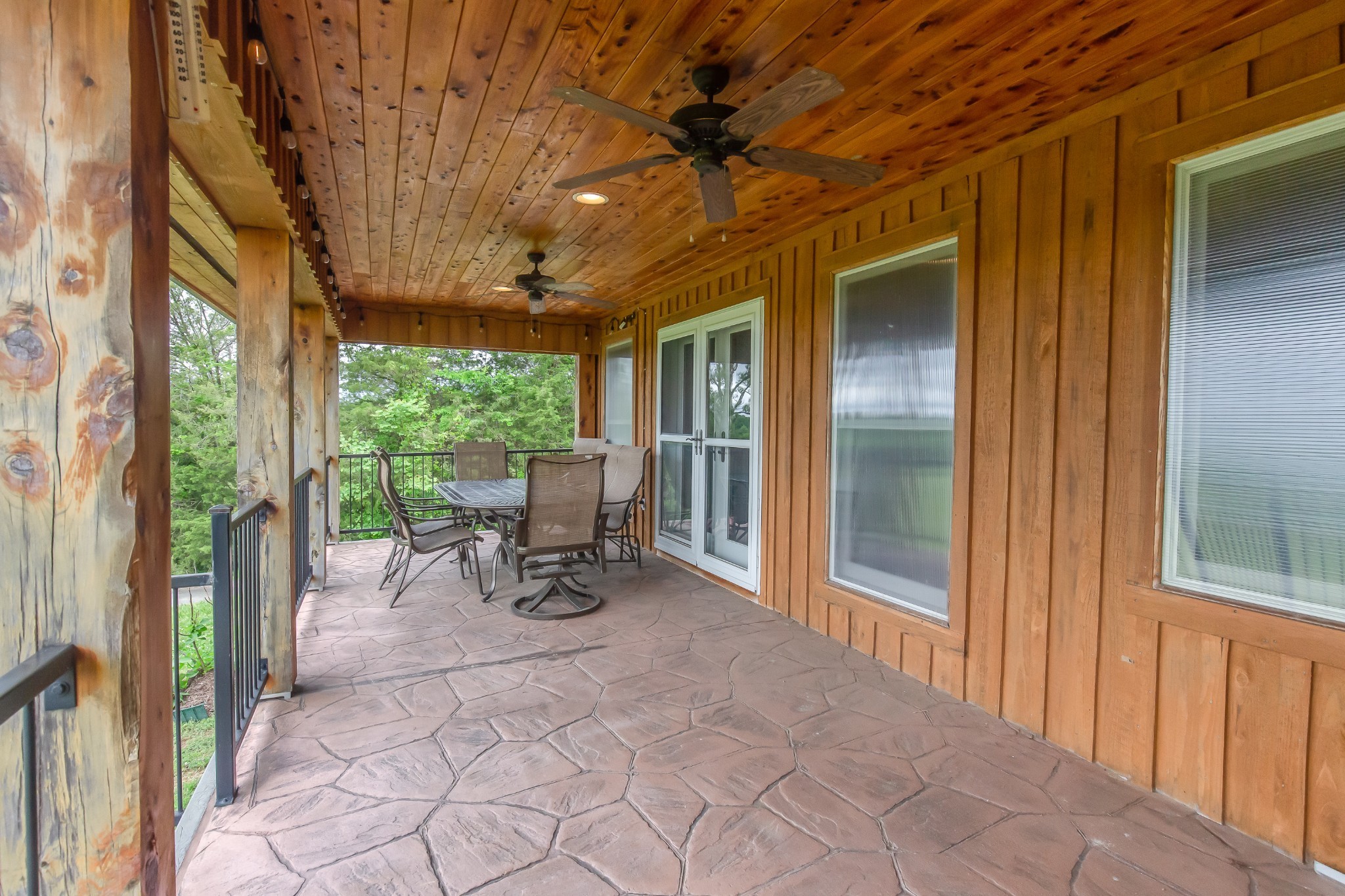 521 Coop Road Bell Buckle, TN 37020 - Photo 55 of 63 a view of a porch with chairs and backyard