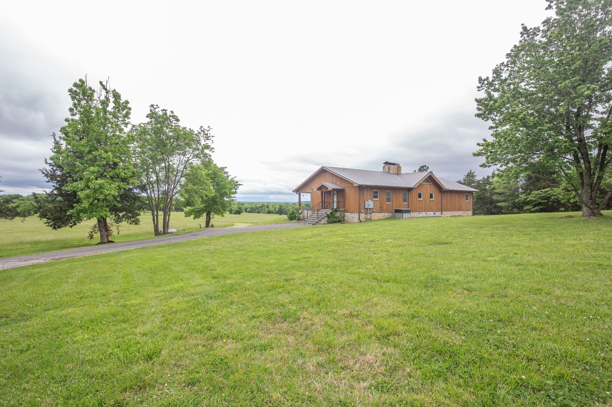 521 Coop Road Bell Buckle, TN 37020 - Photo 8 of 63 a front view of house with garden