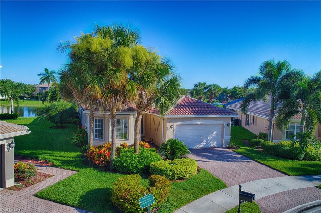 2131 Khasia Point Naples, FL 34119 - Photo 23 of 25 Side Angle of Front Elevation