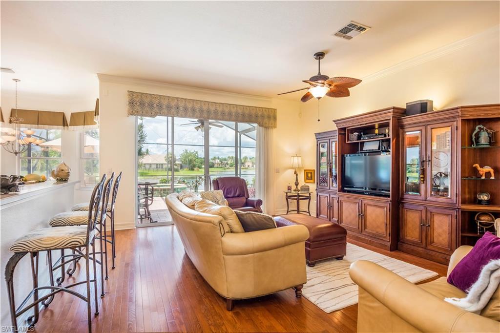 2131 Khasia Point Naples, FL 34119 - Photo 5 of 25 Open Living Space with Access to Lanai