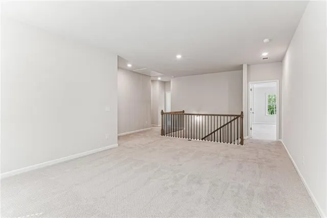 a view of a hallway with closet area