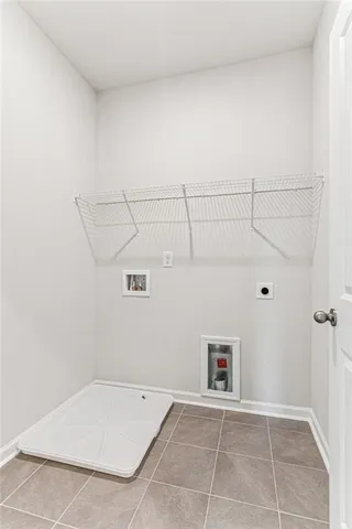 a outdoor space with a couch and a fireplace