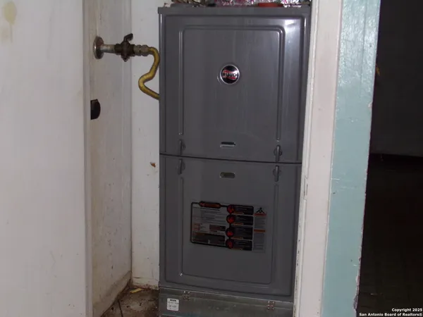 a bathroom with a shower and a mirror