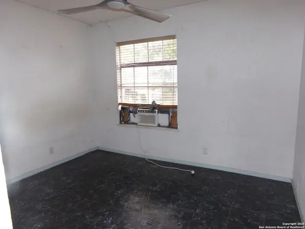 an empty room with a window