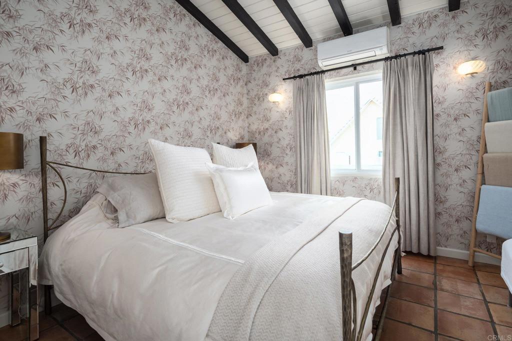 1935 Santa Fe Avenue Del Mar, CA 92014 - Photo 11 of 42 a bedroom with a bed and a window