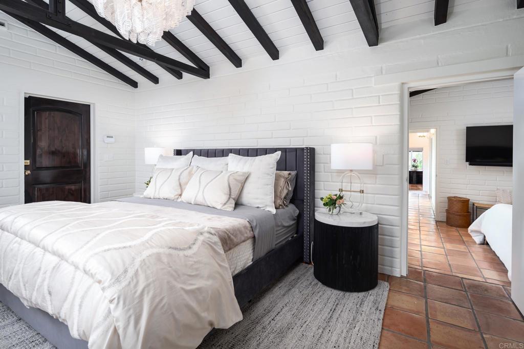 1935 Santa Fe Avenue Del Mar, CA 92014 - Photo 16 of 42 a bedroom with a bed and a television