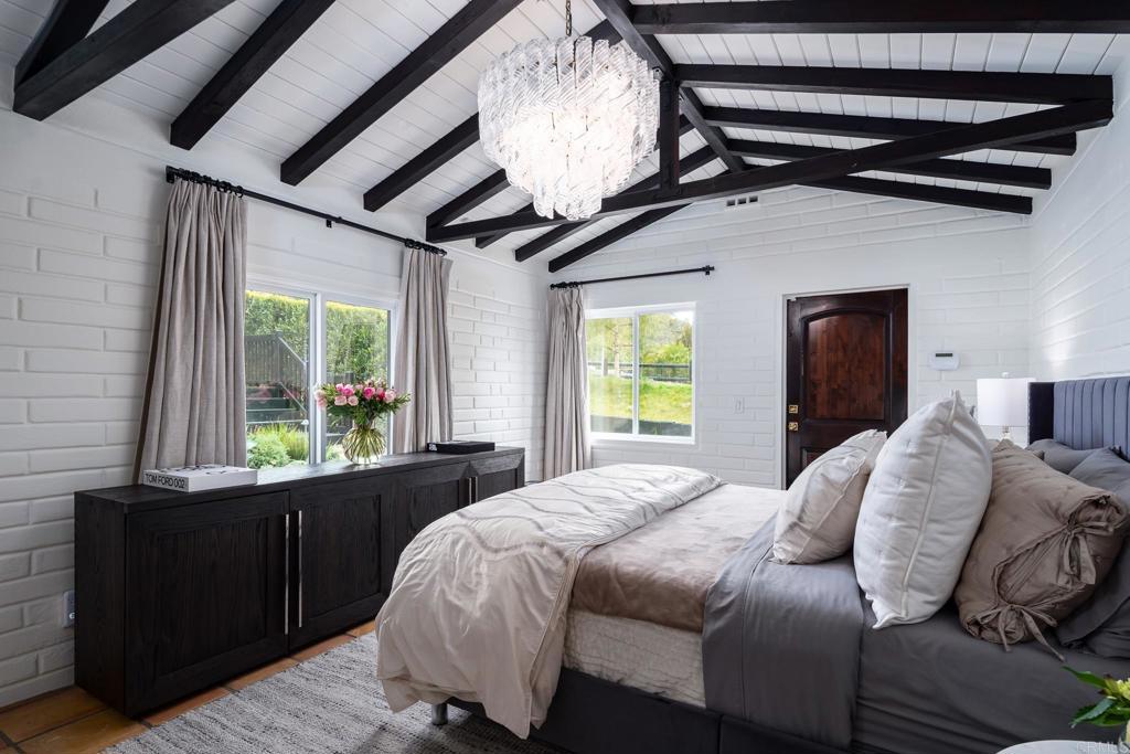 1935 Santa Fe Avenue Del Mar, CA 92014 - Photo 17 of 42 a bedroom with a bed and a window