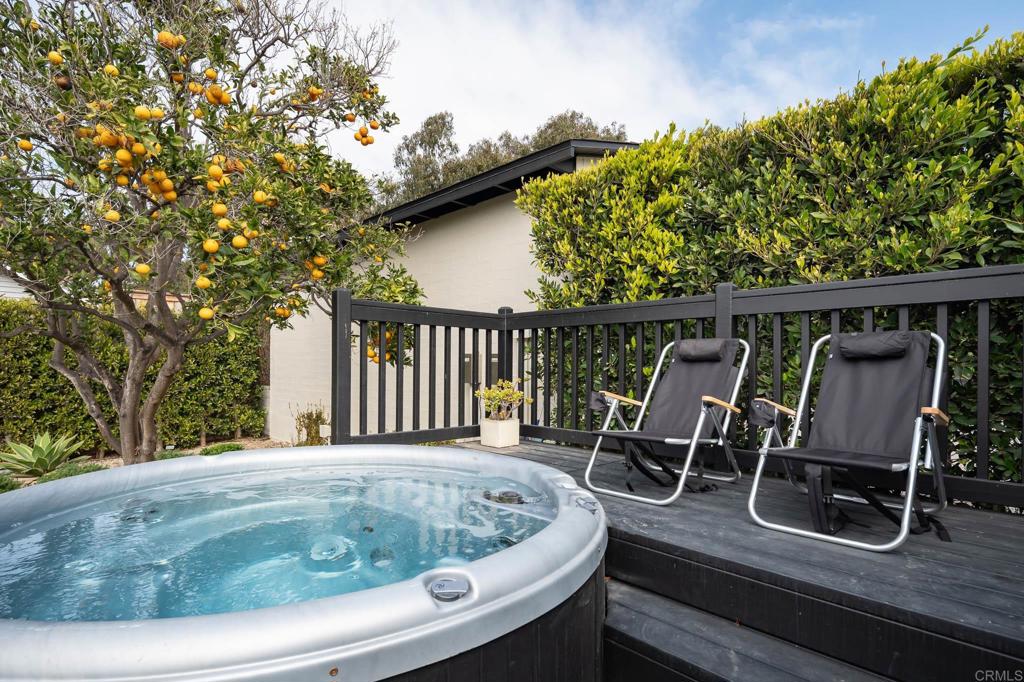 1935 Santa Fe Avenue Del Mar, CA 92014 - Photo 22 of 42 a view of roof deck with chairs and wooden fence