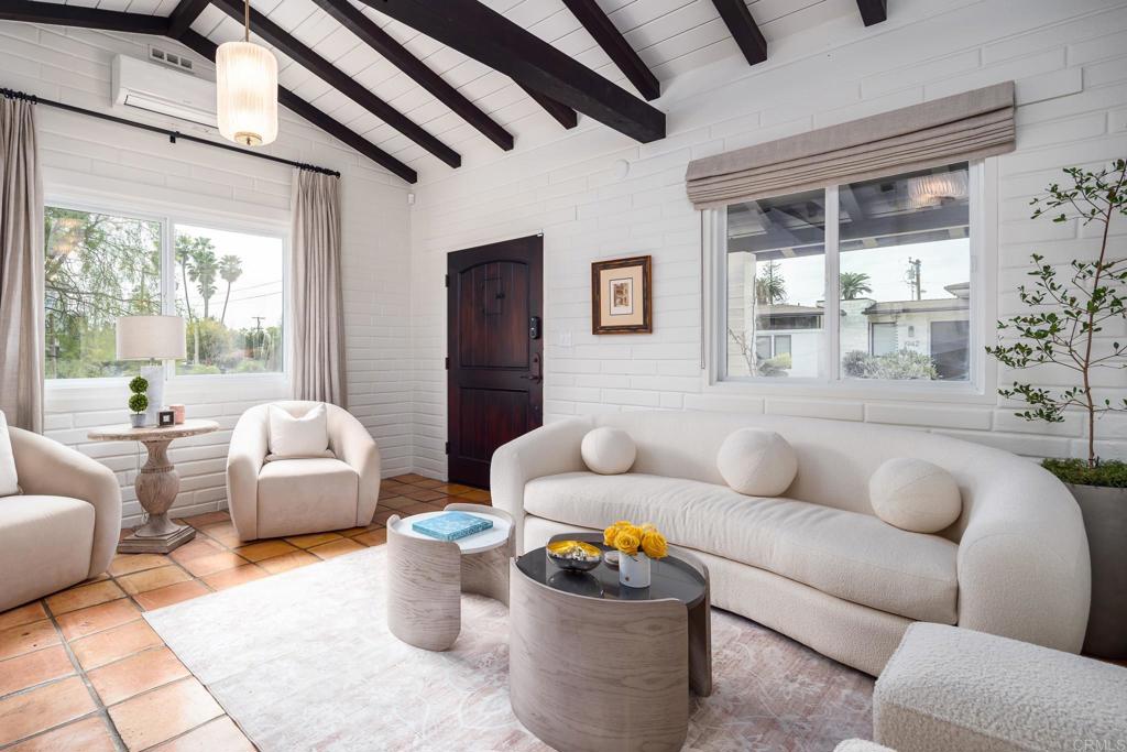 1935 Santa Fe Avenue Del Mar, CA 92014 - Photo 5 of 42 a living room with furniture and a large window
