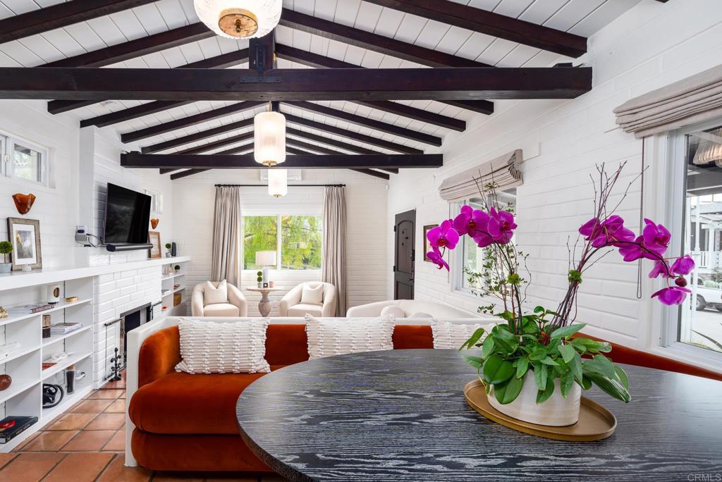 1935 Santa Fe Avenue Del Mar, CA 92014 - Photo 6 of 42 a living room with furniture fireplace and a potted plant