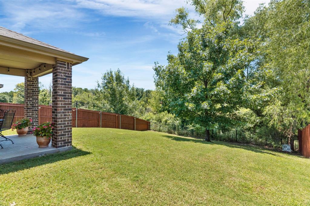 1104 Cheyenne Drive Aubrey, TX 76227 - Photo 1 of 1 Come & get it.....Panoramic views of the greenbelt-nature preserve behind this Cross Oak Ranch home means total privacy. Great play space for kids & pets too! Everyone loves the treeline setting & no direct neighbors behind!