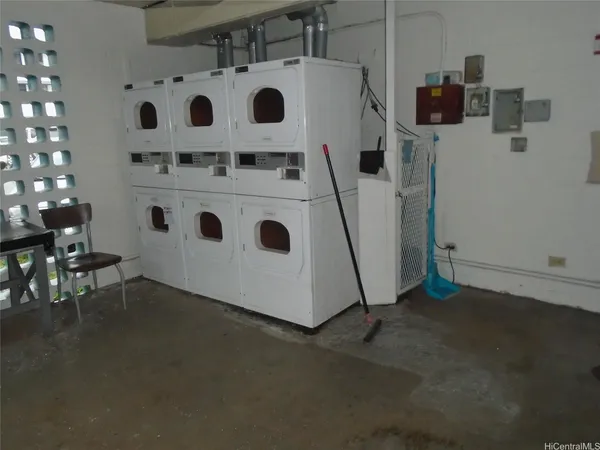a view of a storage & utility room with washer and dryer