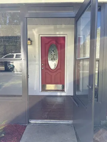 a view of a hallway with elevator