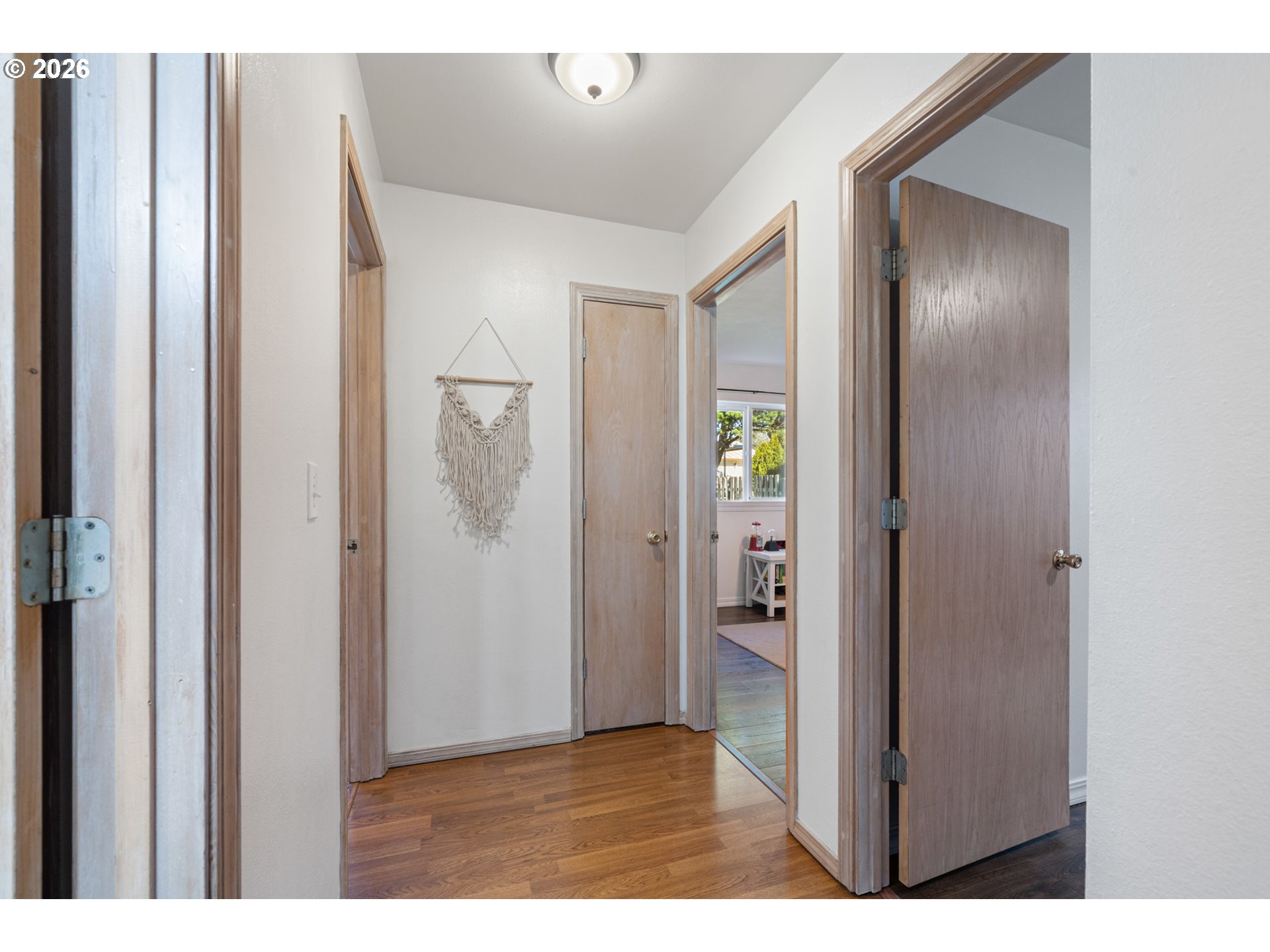 3500 Hawthorne Lane Tillamook, OR 97141 - Photo 15 of 35 a view of a hallway with wooden floor