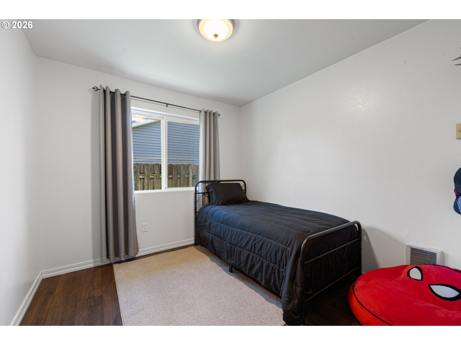 3500 Hawthorne Lane Tillamook, OR 97141 - Photo 20 of 35 a bedroom with a large bed and a window