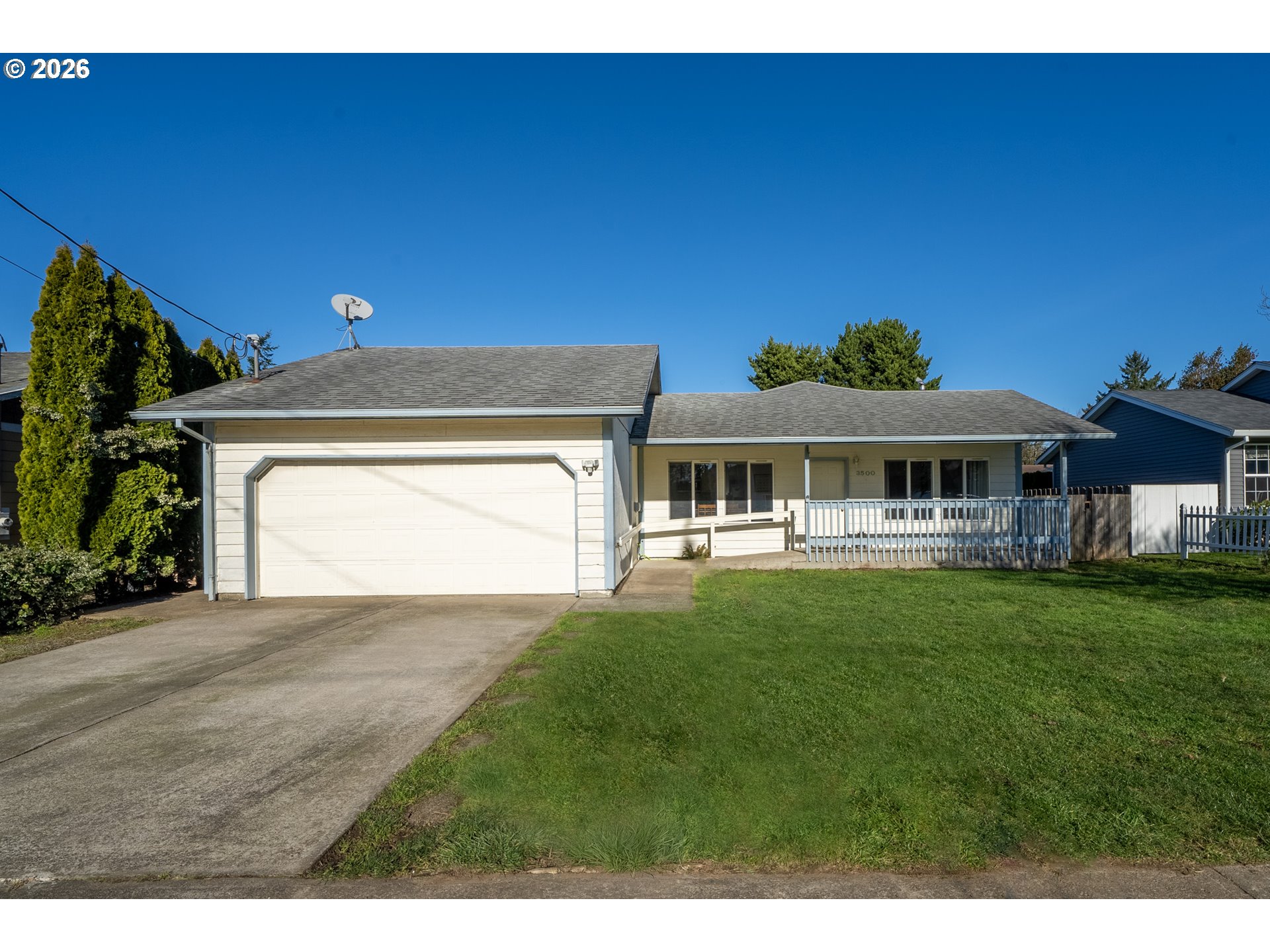 3500 Hawthorne Lane Tillamook, OR 97141 - Photo 2 of 35 a front view of a house with a garden and yard