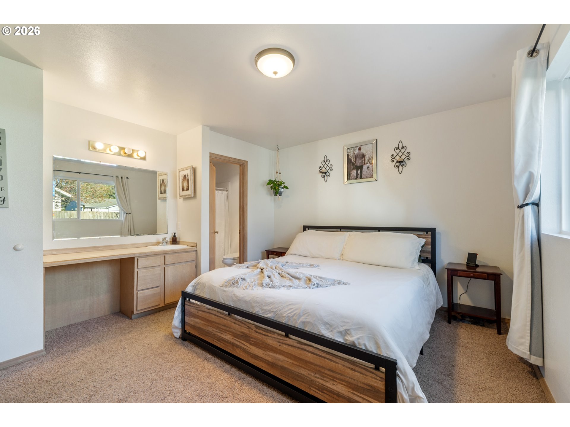 3500 Hawthorne Lane Tillamook, OR 97141 - Photo 22 of 35 a bedroom with a bed and a desk