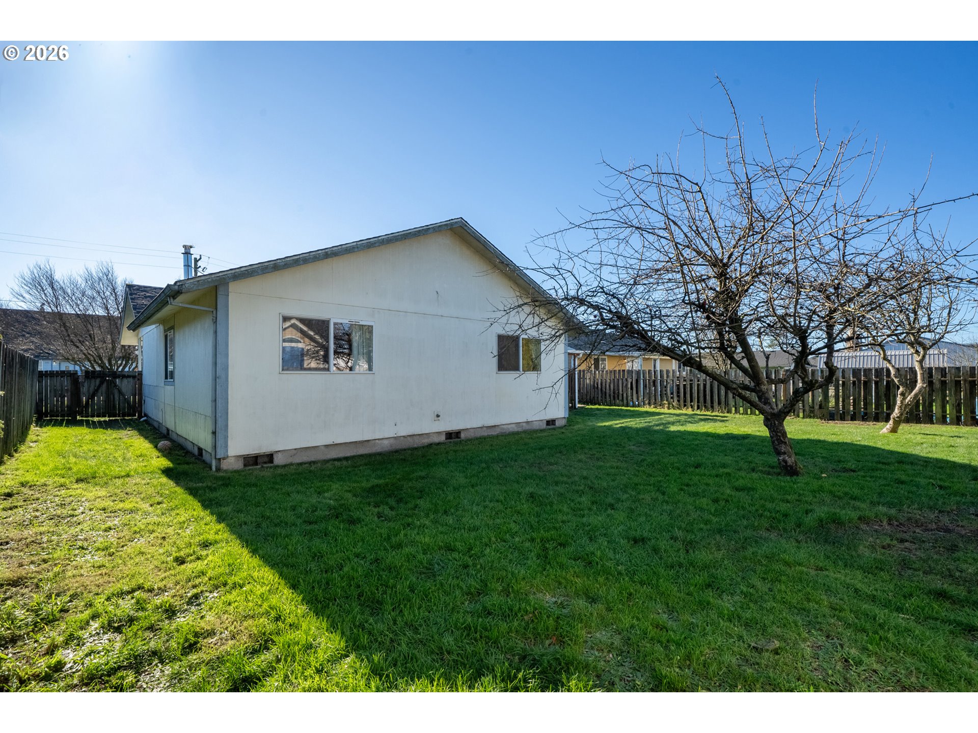 3500 Hawthorne Lane Tillamook, OR 97141 - Photo 33 of 35 a view of a backyard with large trees