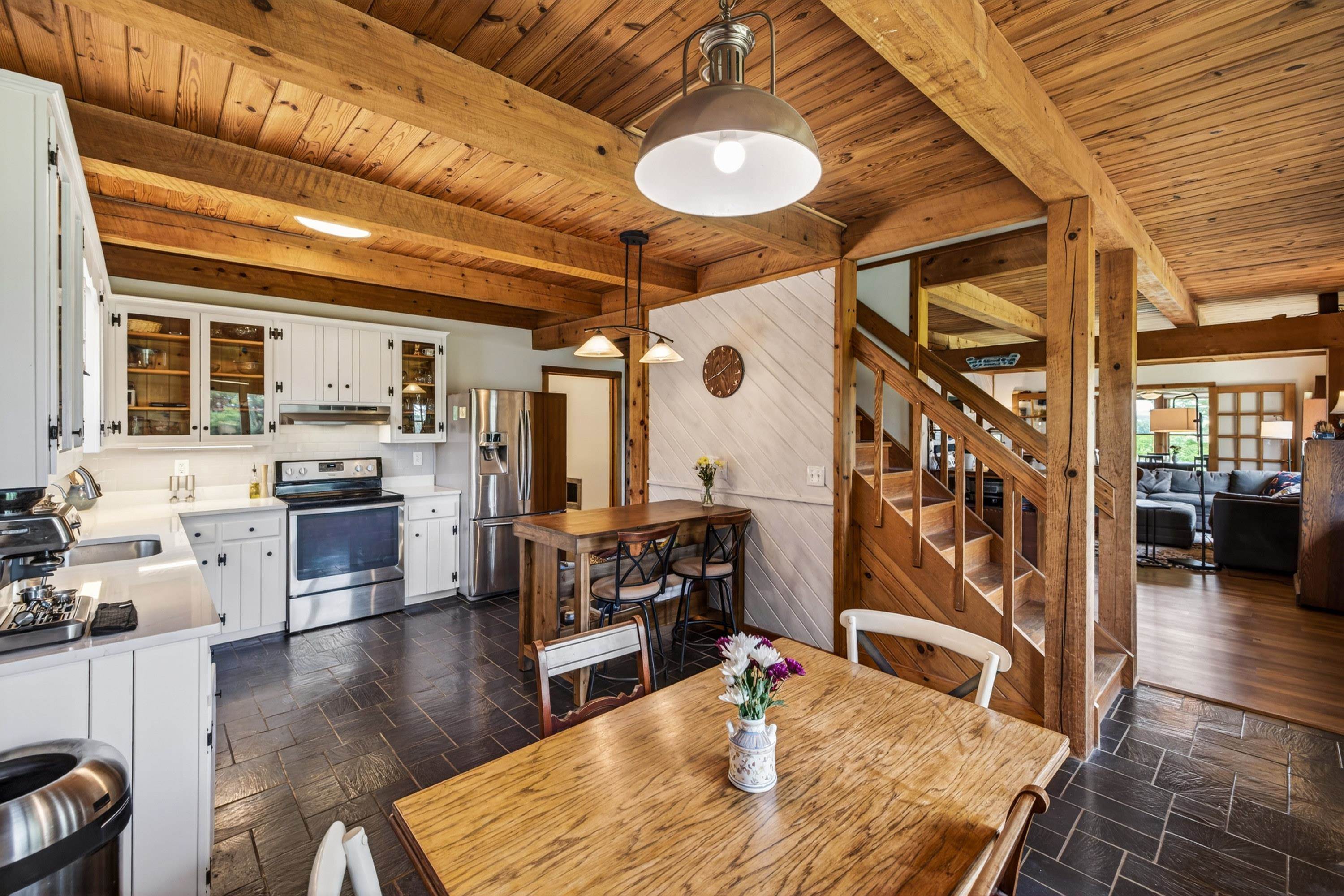 3980 Greenmount Road Harrisonburg, VA 22802 - Photo 21 of 75 The kitchen offers an eat-in dining area, white wooden cabinetry, large windows, and an abundance of cabinetry for storage. This home features stainless steel appliance and many more upgrades!