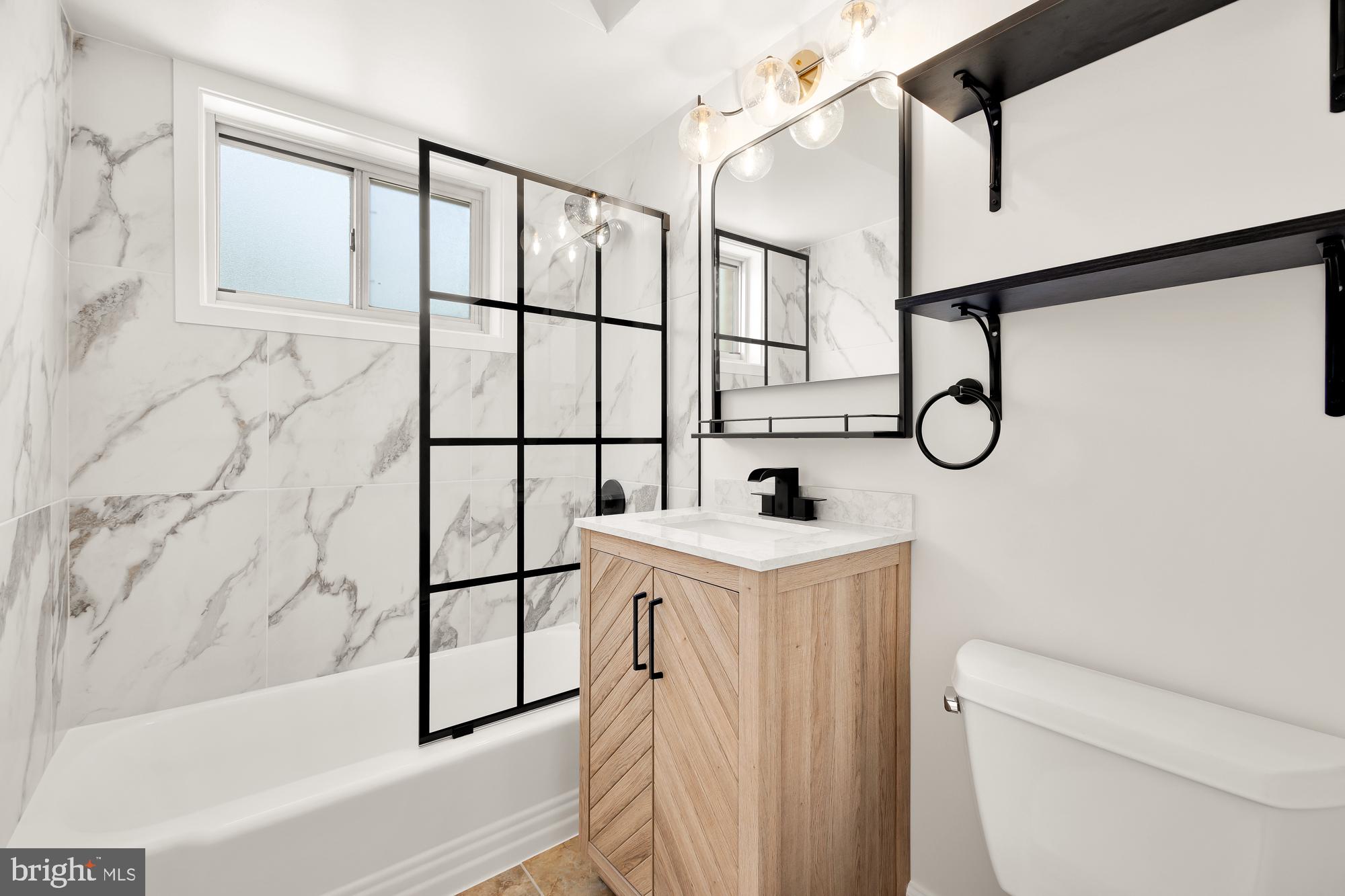 3900 Tunlaw Road Northwest, Unit 205 Washington, DC 20007 - Photo 21 of 39 Renovated bathroom