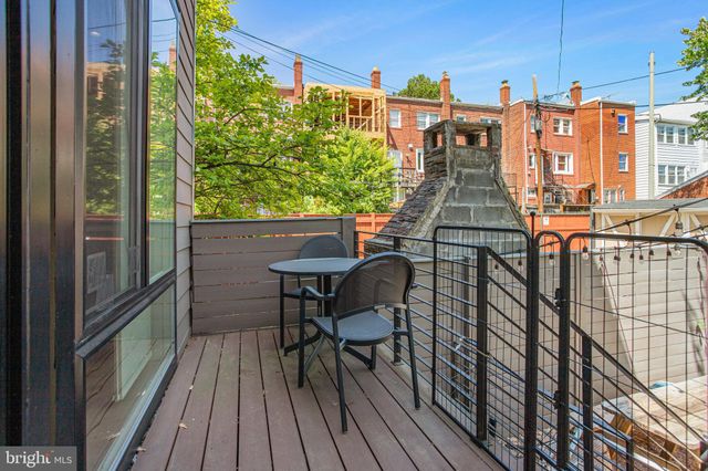 a view of balcony deck and patio