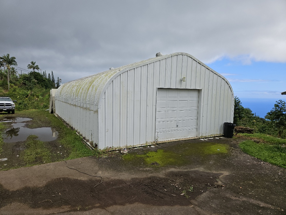 88 Lot Captain Cook, HI 96704 - Photo 3 of 6 a view of a house with backyard