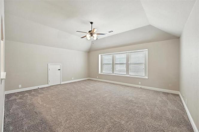 4203 Magnolia Road Melissa, TX 75454 - Photo 13 of 20 Bonus room with ceiling fan, carpet flooring, and lofted ceiling
