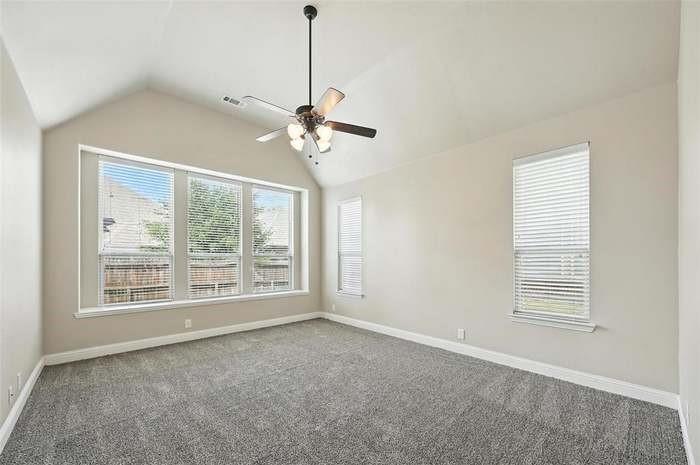 4203 Magnolia Road Melissa, TX 75454 - Photo 8 of 20 Carpeted spare room featuring baseboards and a ceiling fan