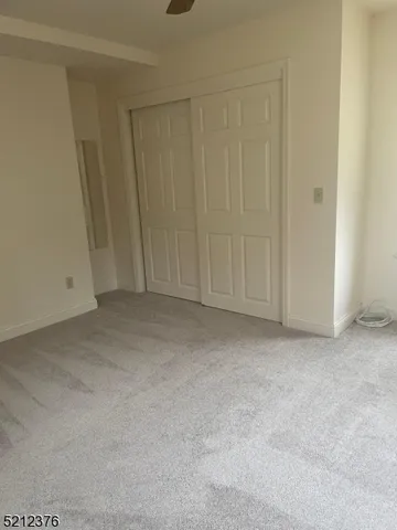 a view of room with hardwood floor