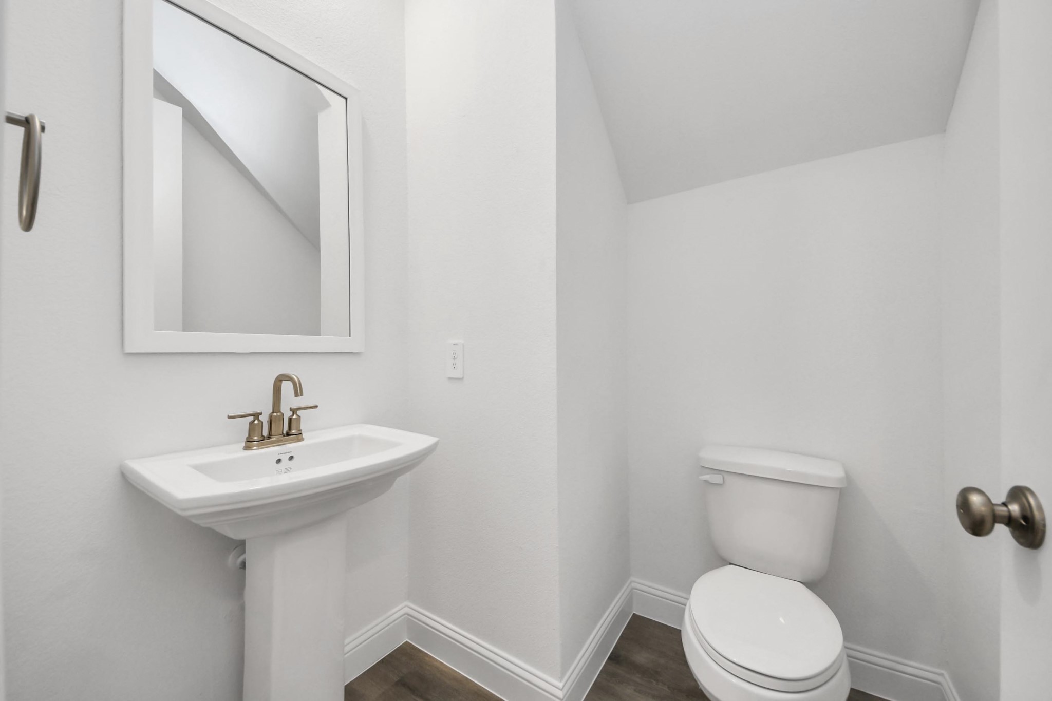 17315 July Moon Lane Conroe, TX 77302 - Photo 39 of 50 a bathroom with a sink a toilet and mirror