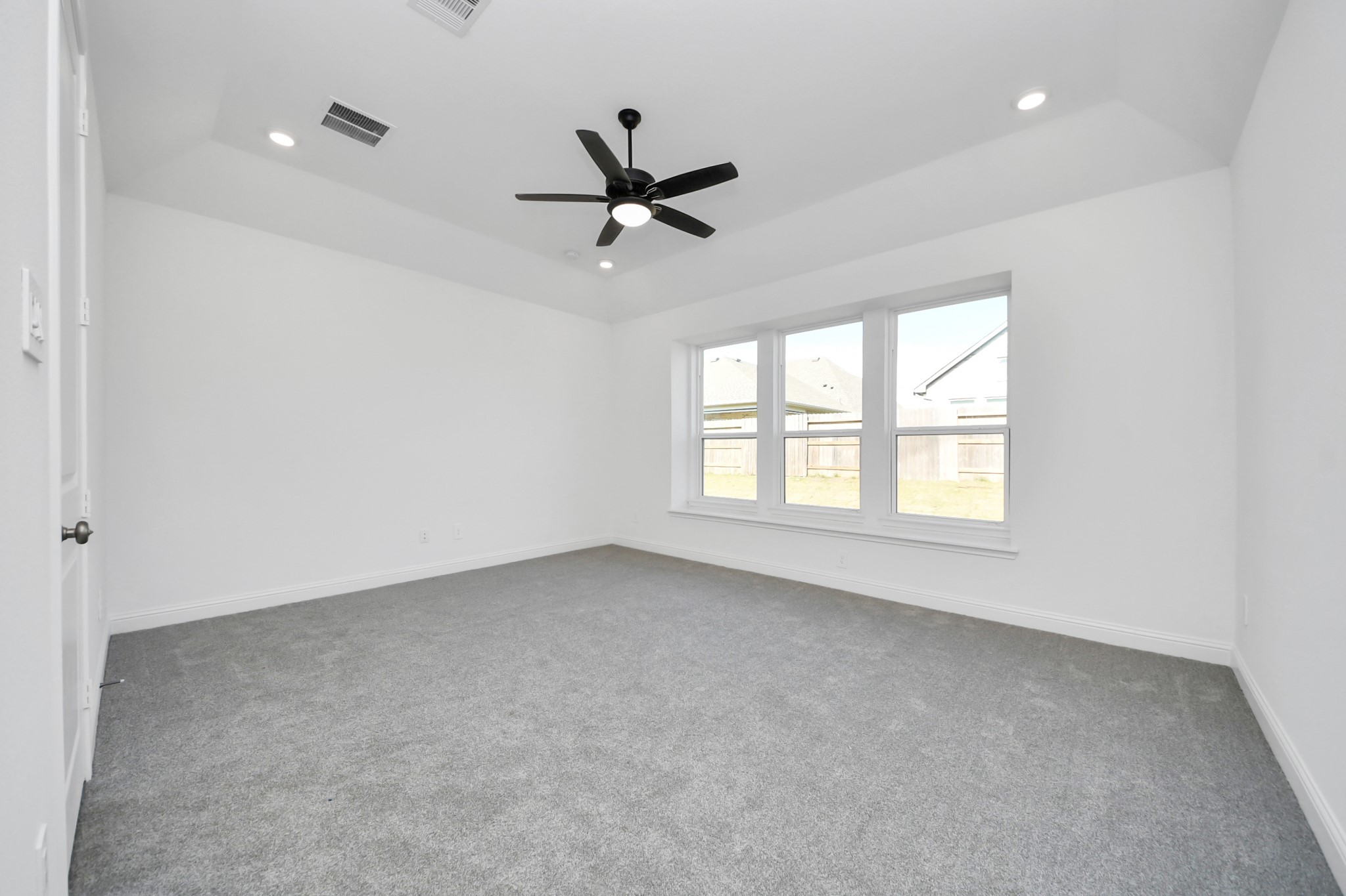 17315 July Moon Lane Conroe, TX 77302 - Photo 41 of 50 a view of an empty room with a window