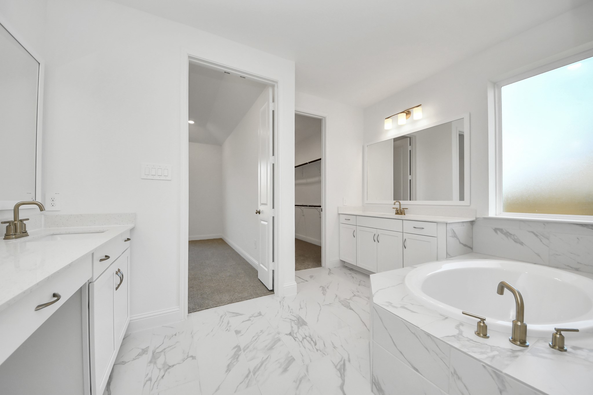 17315 July Moon Lane Conroe, TX 77302 - Photo 45 of 50 a bathroom with a tub sink and mirror