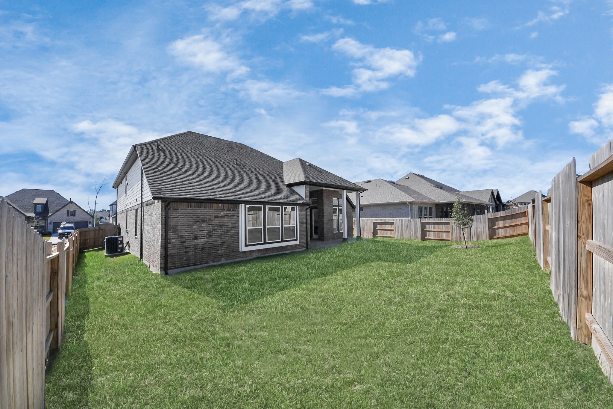 17315 July Moon Lane Conroe, TX 77302 - Photo 9 of 50 a house view with a garden space