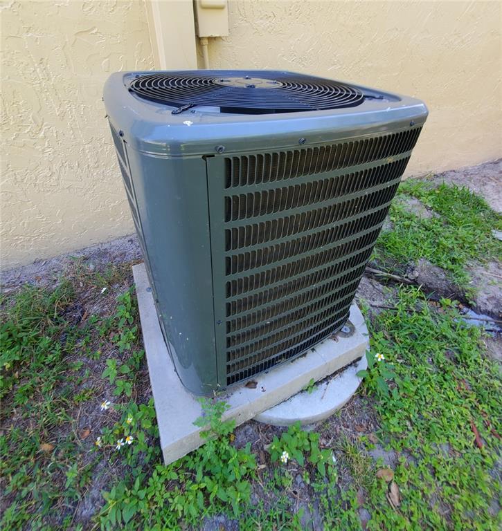 5838 Sun Glo Avenue Port Richey, FL 34668 - Photo 18 of 19 a view of door and yard