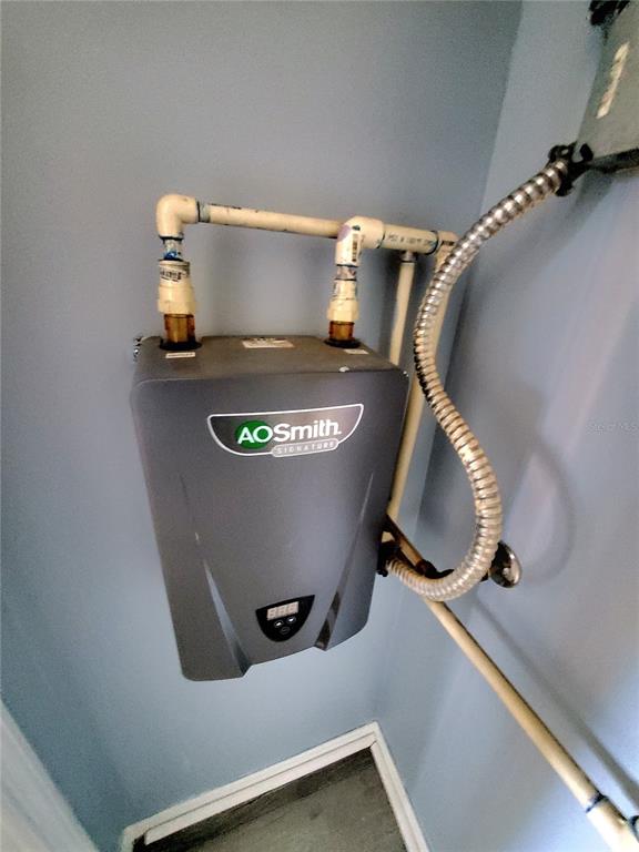 5838 Sun Glo Avenue Port Richey, FL 34668 - Photo 19 of 19 a view of washer and dryer