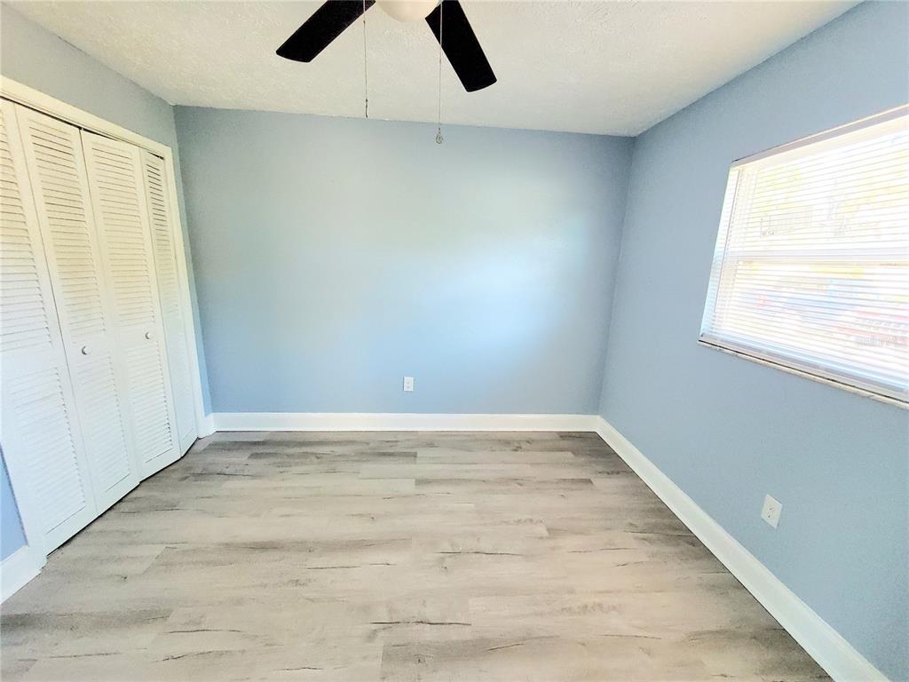 5838 Sun Glo Avenue Port Richey, FL 34668 - Photo 9 of 19 an empty room with window