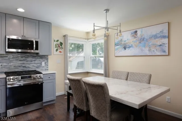 a kitchen with a stove and a microwave