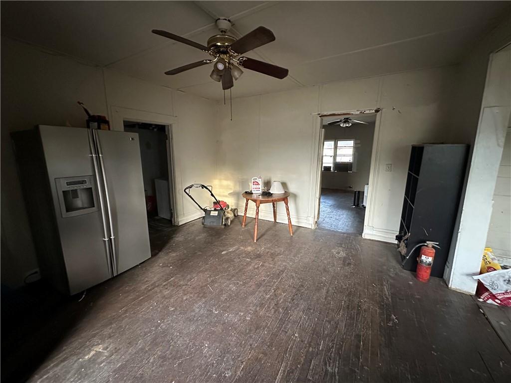 10 Elm Street Covington, GA 30014 - Photo 5 of 14 a view of a livingroom with furniture and a flat screen tv