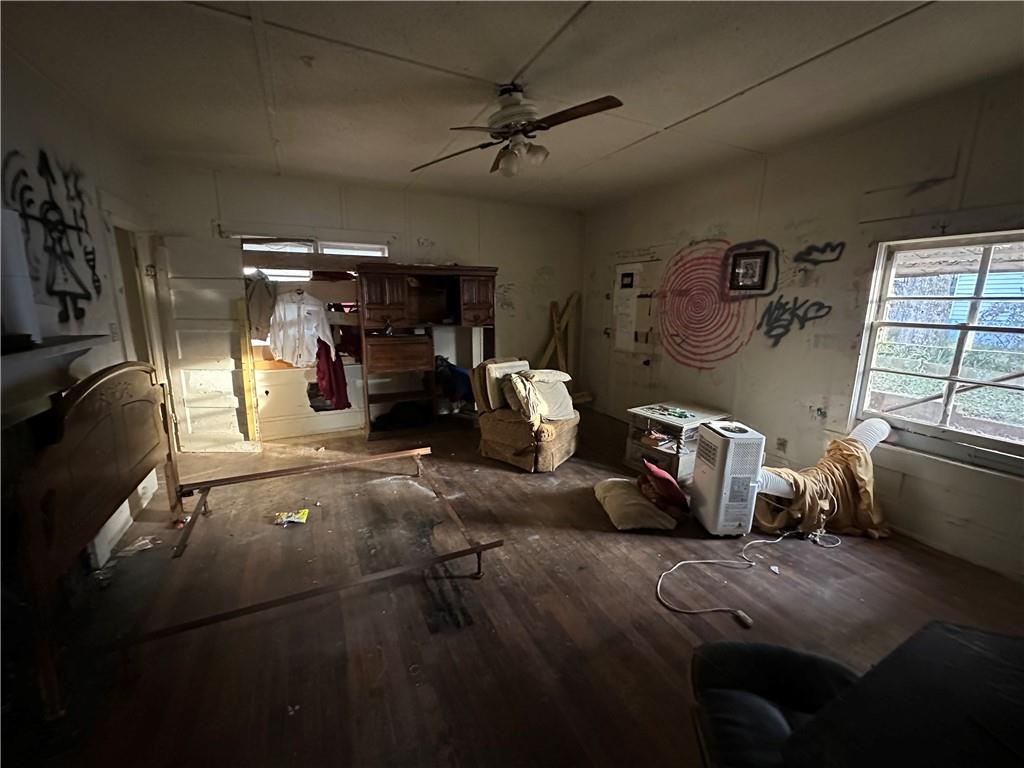 10 Elm Street Covington, GA 30014 - Photo 8 of 14 a view of a livingroom with furniture and a ceiling fan